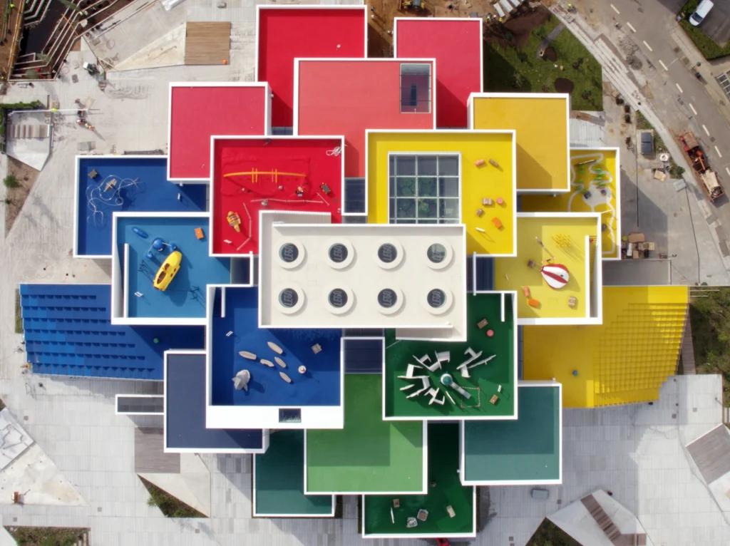 Ariel image of huge buildings with rainbow colored rooftop terraces